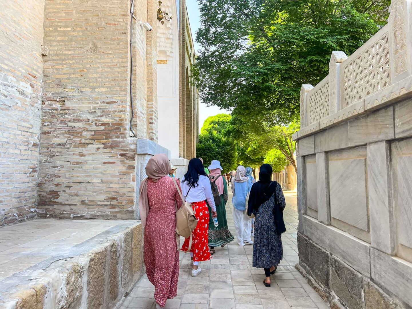 The Wandering Quinn Travel Blog halal travel in Uzbekistan, muslim ladies walking in Uzbekistan
