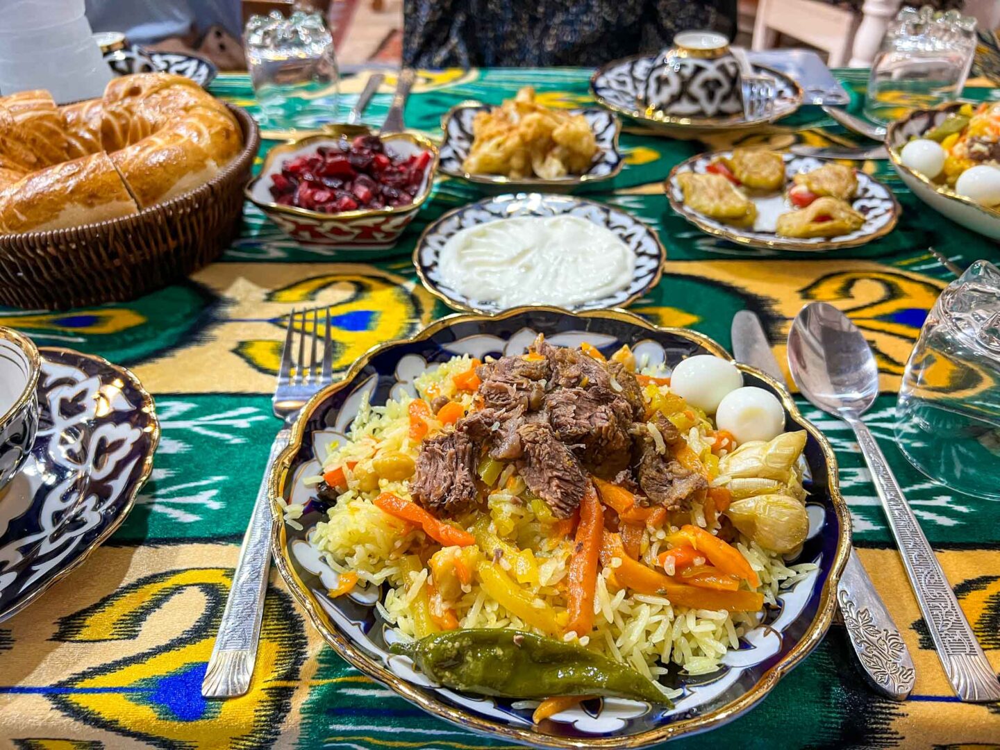 The Wandering Quinn Travel Blog halal travel in Uzbekistan,  plov in uzbekistan with other sides