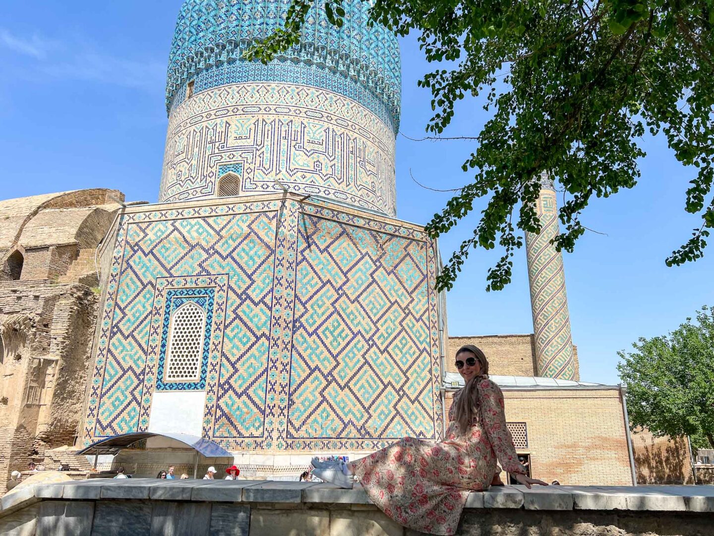 The Wandering Quinn Travel Blog halal travel in Uzbekistan,  Ellie outside mosque in Samarkand
