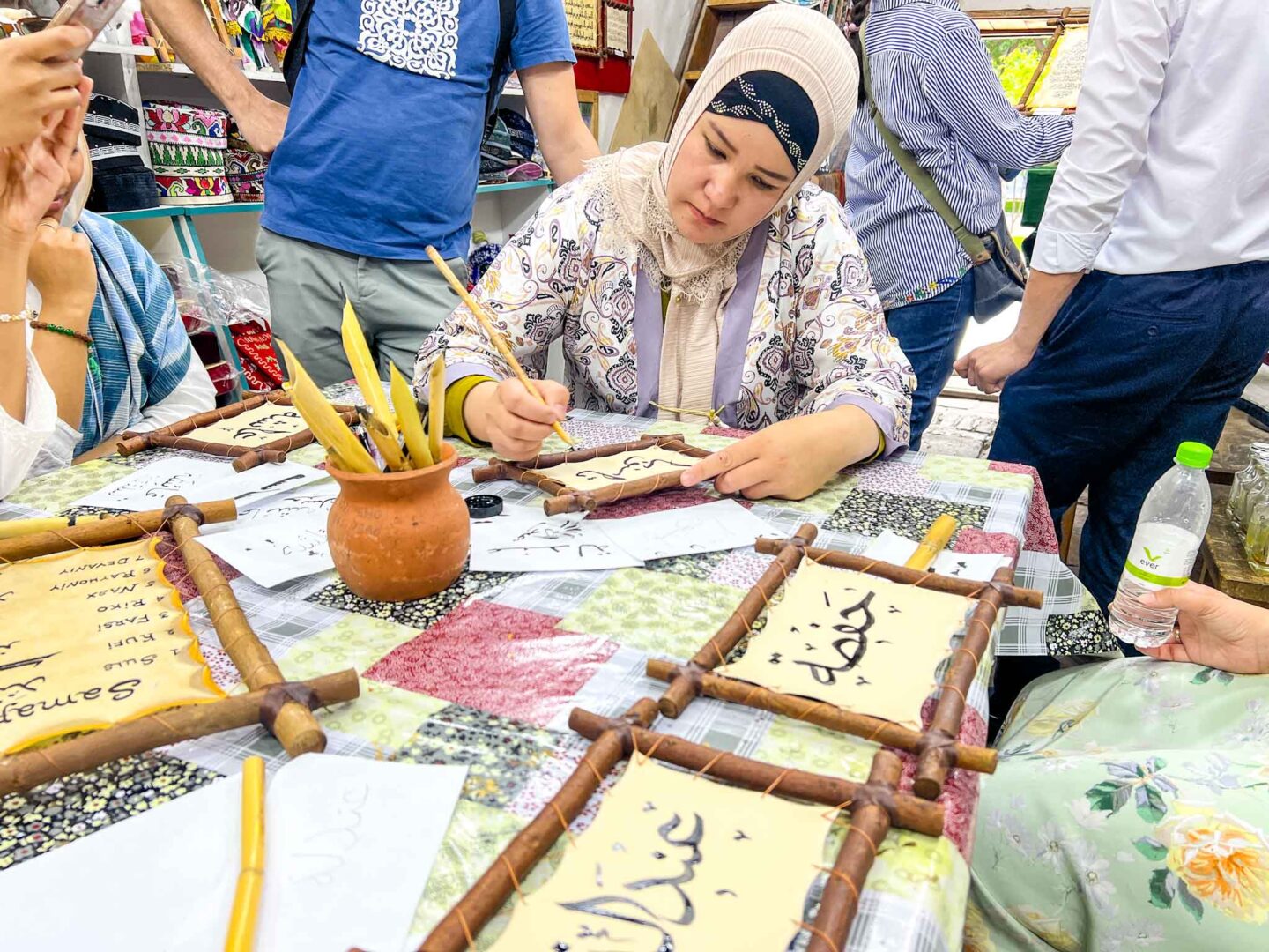 The Wandering Quinn Travel Blog halal travel in Uzbekistan,  calligraphy class in Samarkand