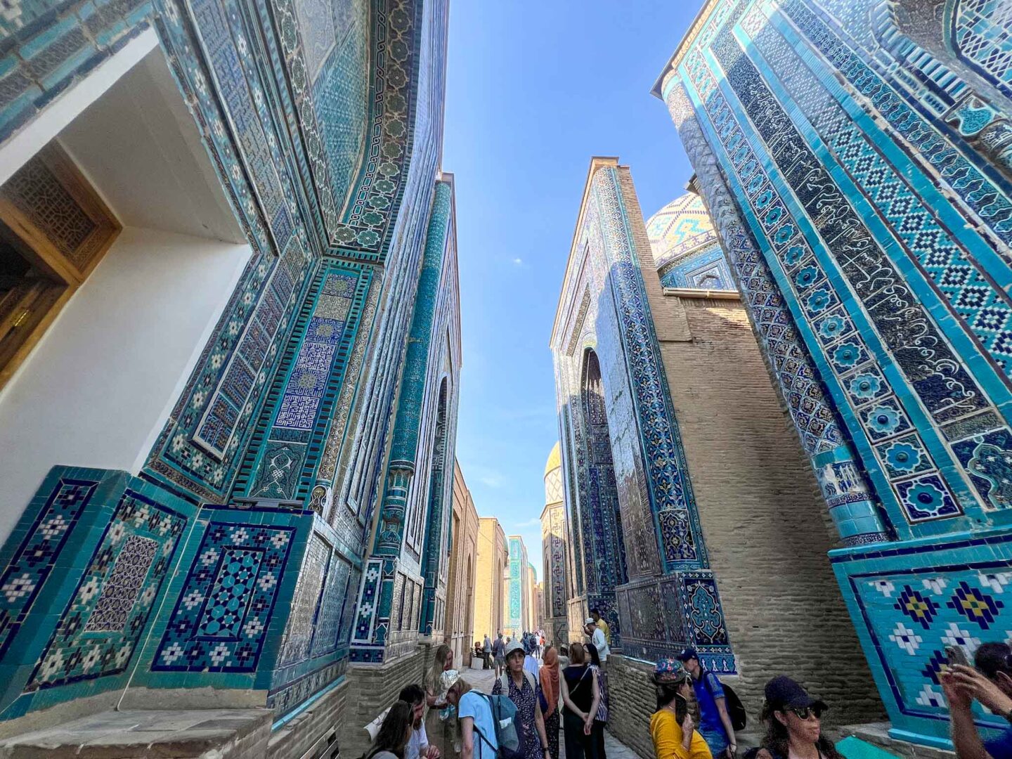 The Wandering Quinn Travel Blog What to wear Uzbekistan, tourists inside Samarkand attraction 