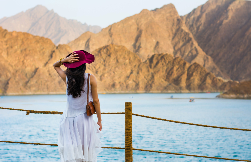 The Wandering Quinn Travel Blog hatta day trip, women in white outfit in hatta