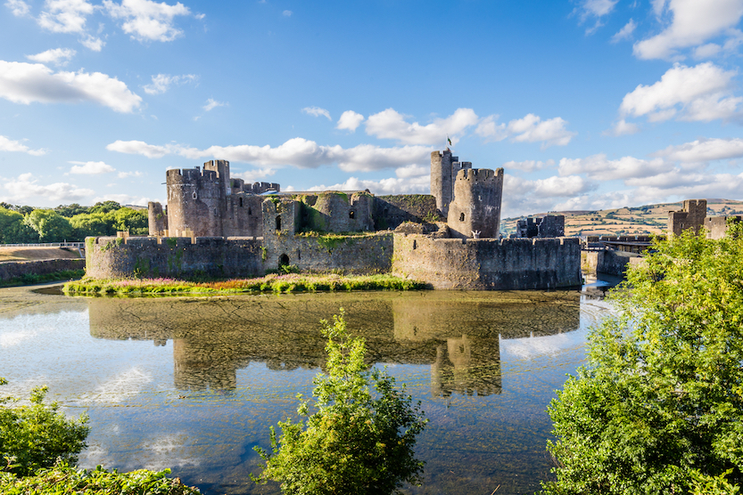 The Wandering Quinn Travel Blog Day trips from Cardiff by train, Caerphilly Castle with blue sky
