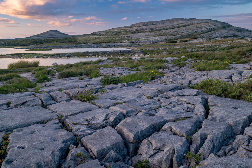 The Wandering Quinn Travel Blog Day trips from Galway, rocks in Burren national park at sunset