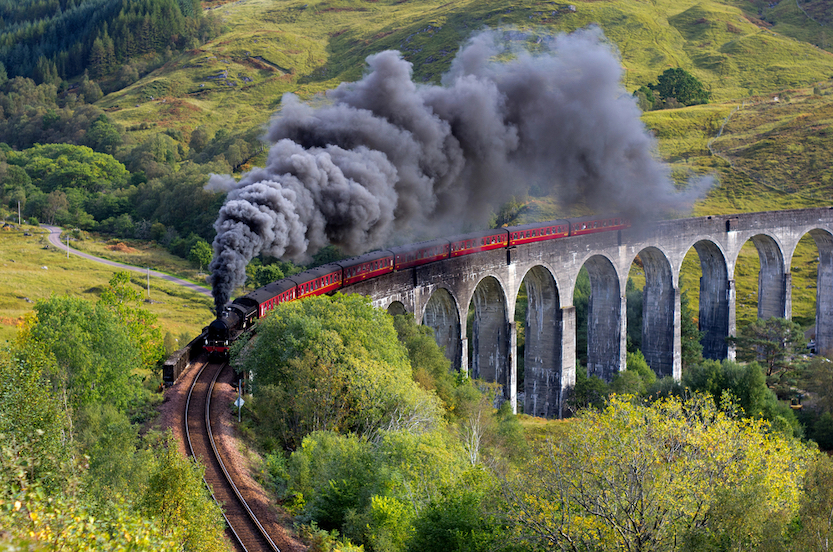 The Wandering Quinn Travel Blog things to do in the Scottish Highlands, Jacobite Stream train going over the bridge