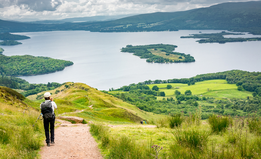 The Wandering Quinn Travel Blog things to do in the Scottish Highlands, people hiking overlooking Loch Lomond