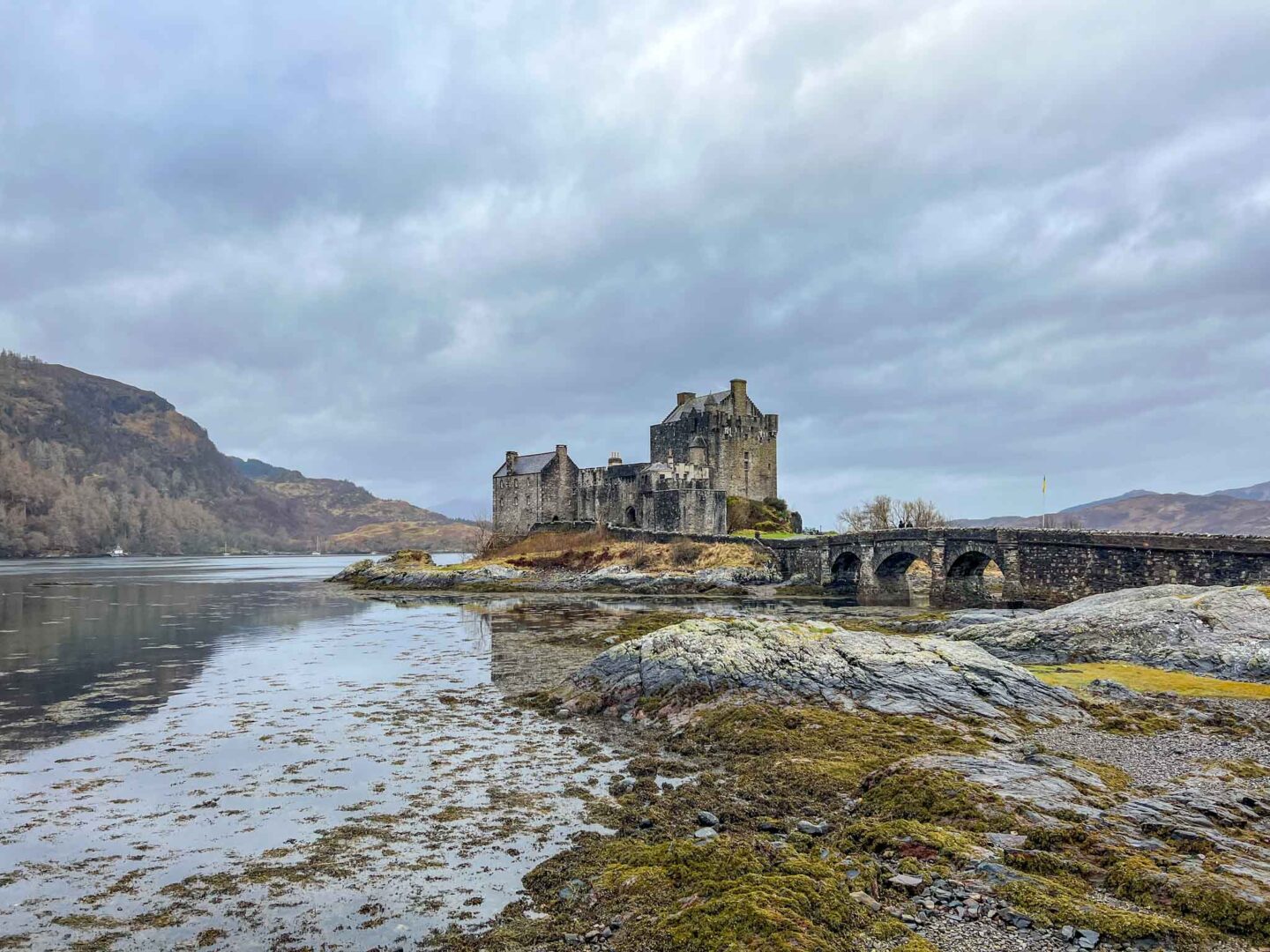 The Wandering Quinn Travel Blog things to do in the Scottish Highlands, Eilean Donan castle from side