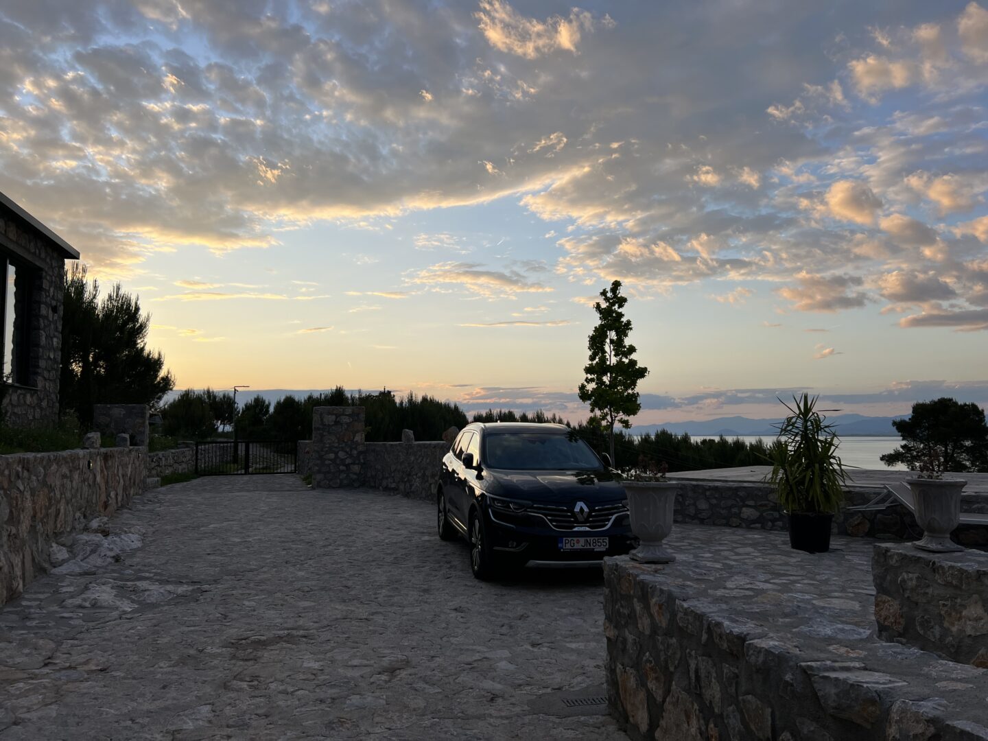 The Wandering Quinn Travel Blog how to get from Montenegro to Albania, hire car and sunset in Albania