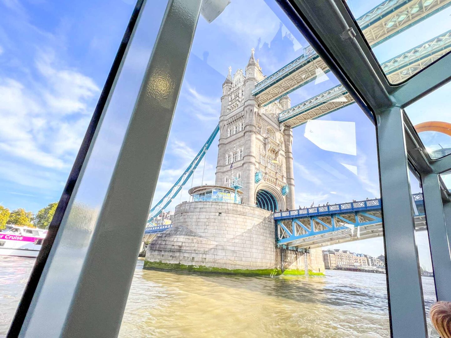 The Wandering Quinn Travel Blog tower bridge from inside the Uber Thames Boat