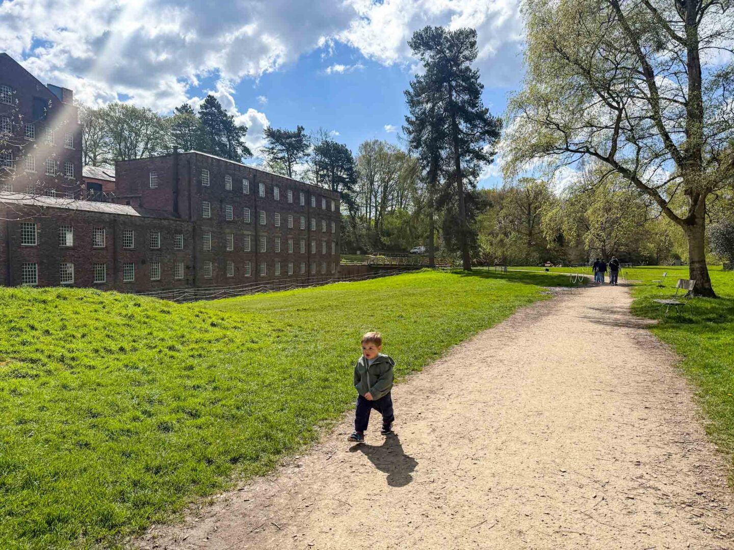 things to do in Manchester may half term, toddler outside the mill at quarry bank