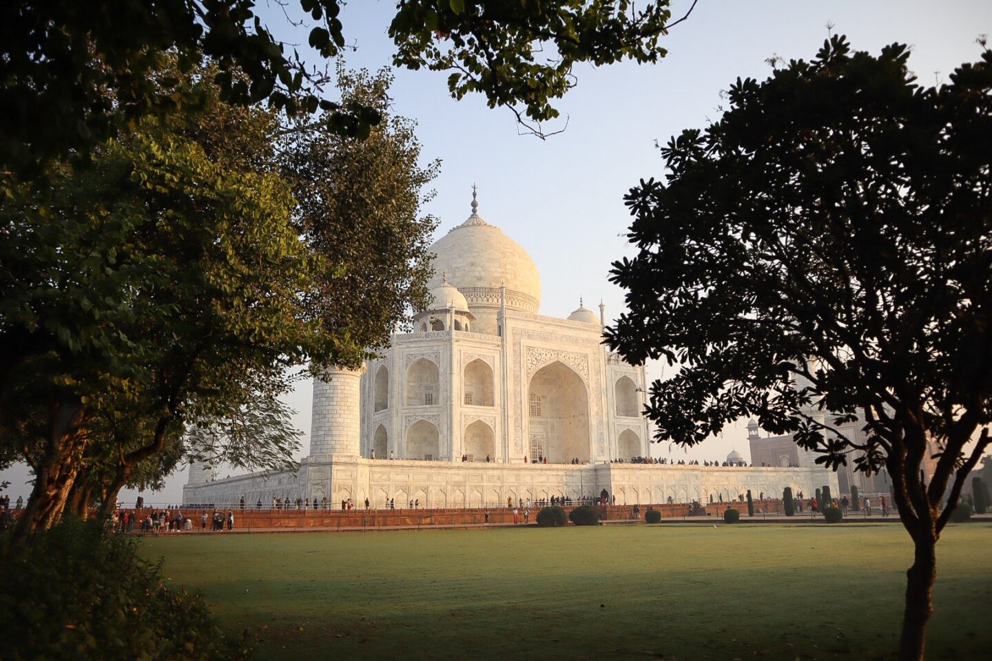 Best countries to visit in October, Taj Mahal in India through the trees