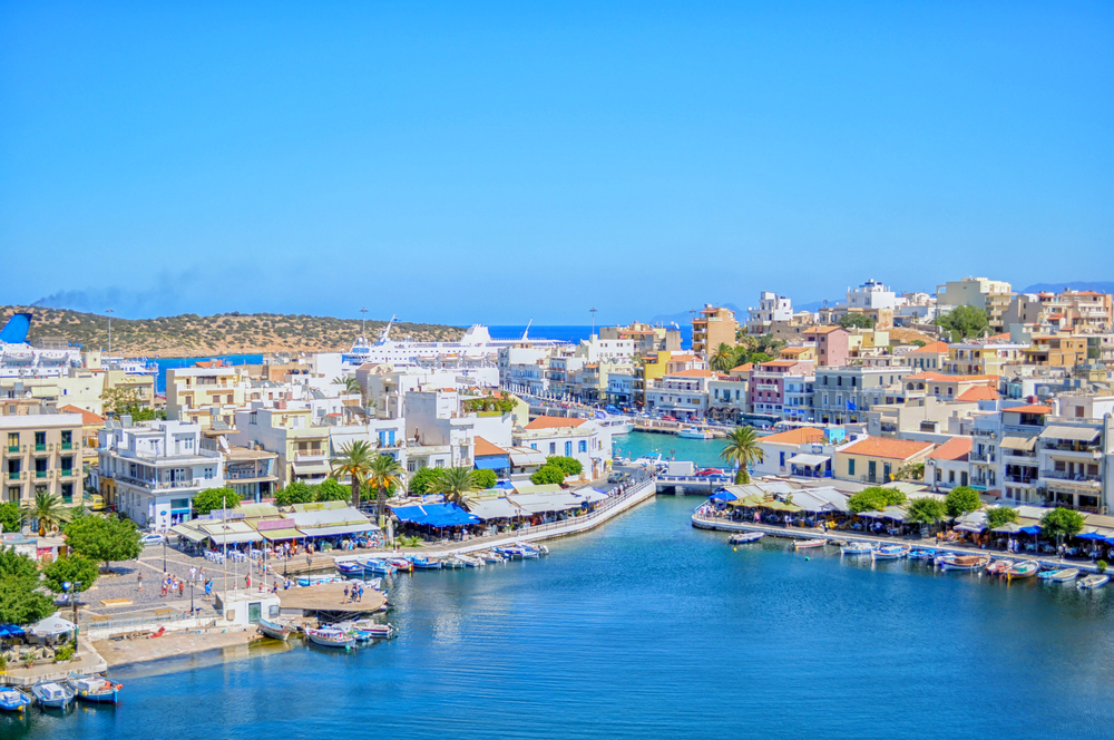 best countries to visit in October, island of crete with blue sky
