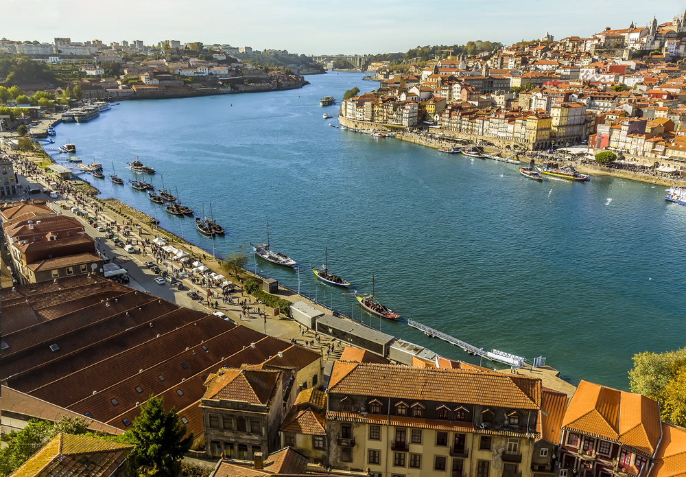 best places to visit in Europe in October, Porto river in autumn light