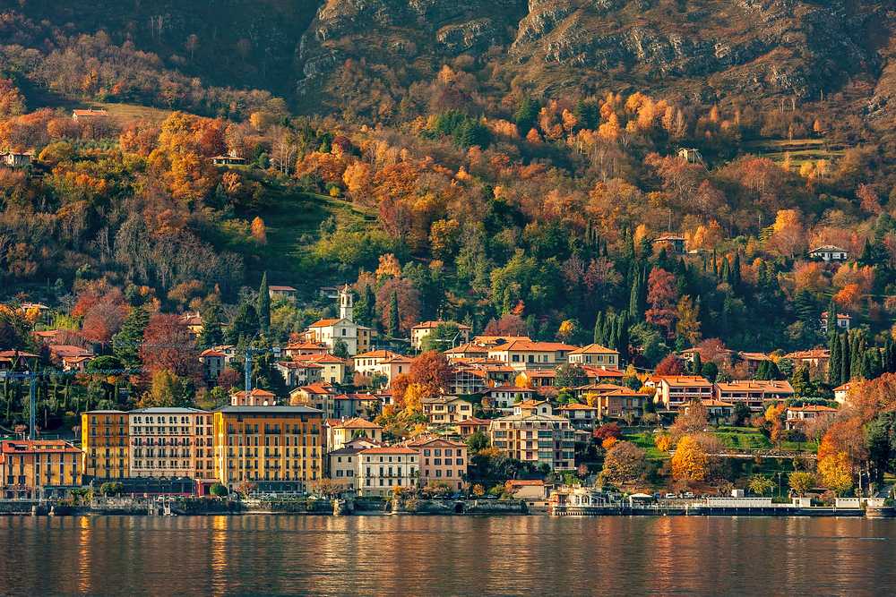 best places to visit in Europe in October, Small town on the shore of Lake Como in autumn in Italy.