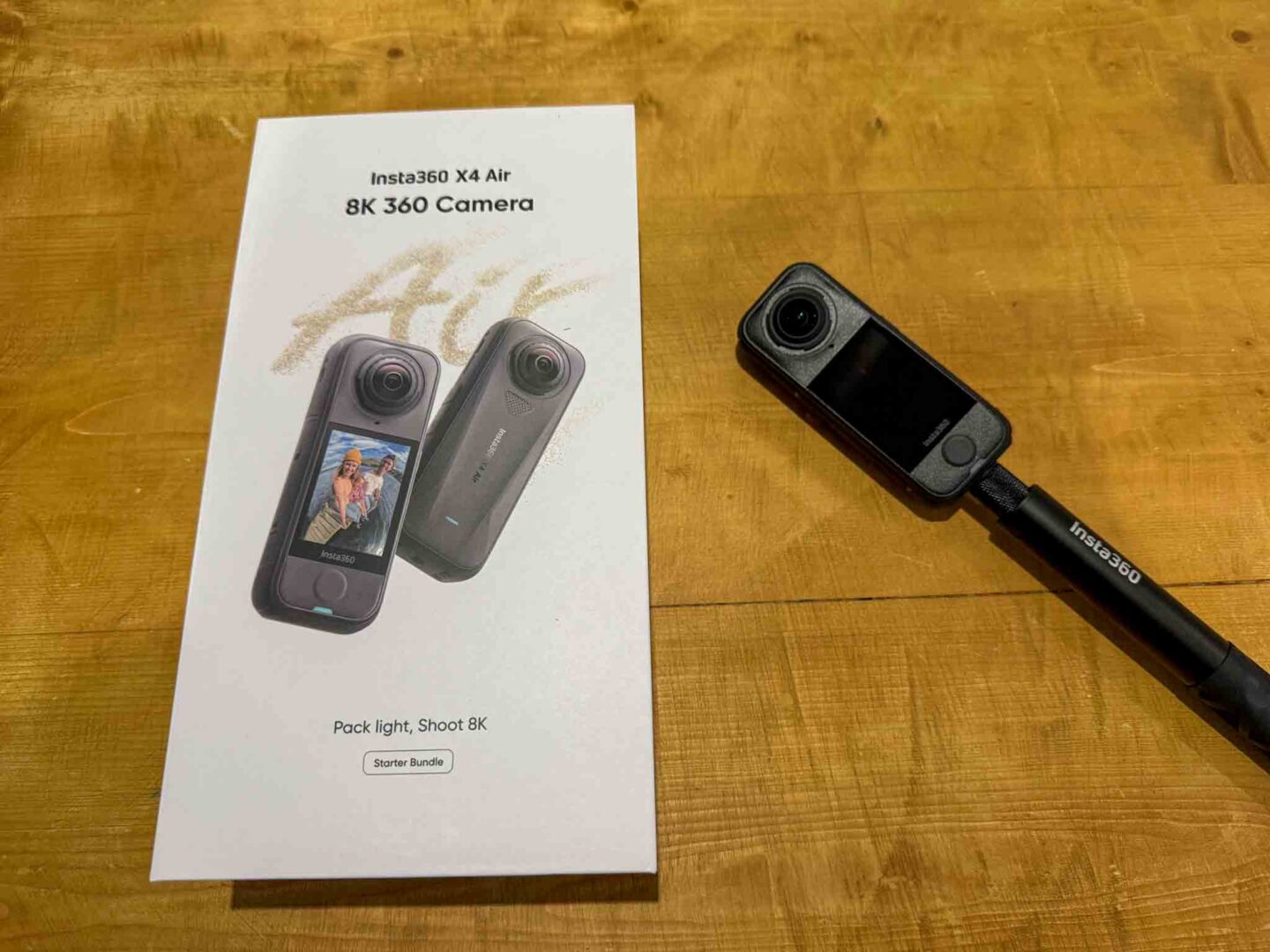 Insta 360 x4 air next to box