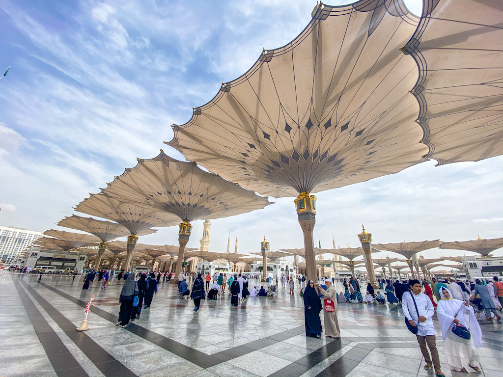 Best countries to visit in October, people in Madinah masjid