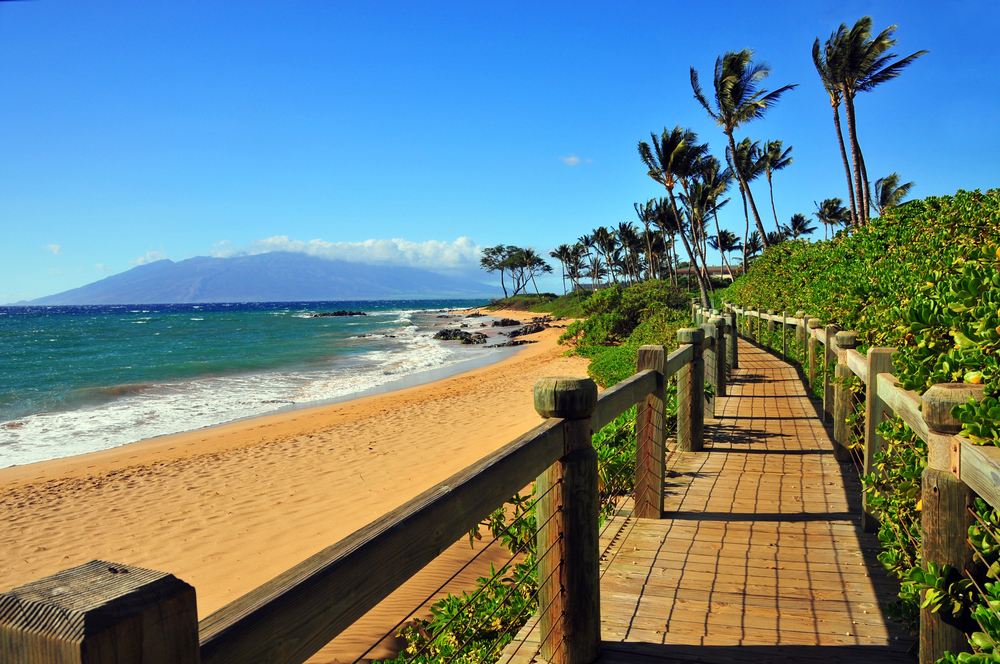 best places to visit in North America in October, Maui Beach with palm trees and boardwalk