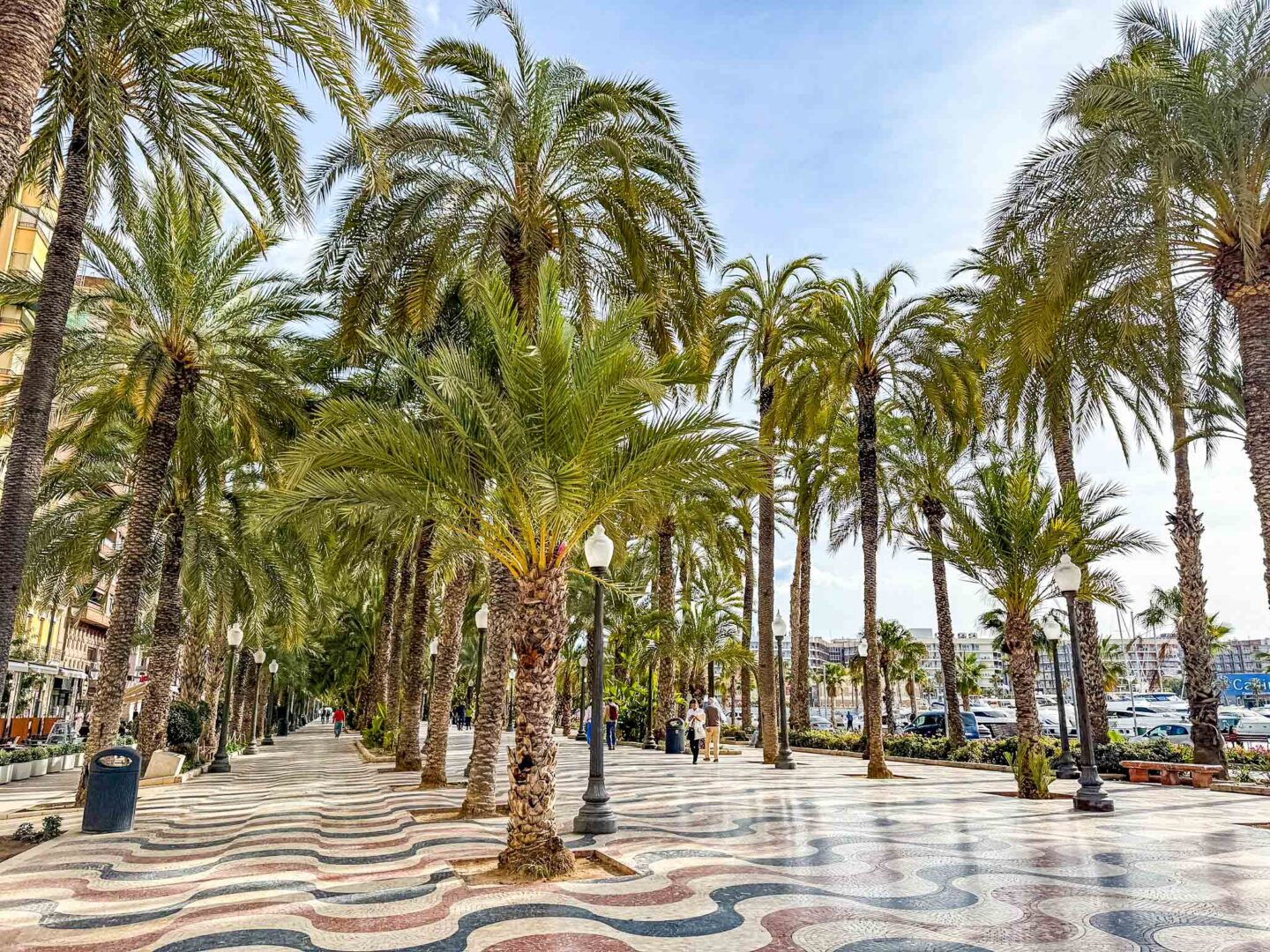 Alicante boardwalk in winter with sunshine, warm places to visit in December in Europe
