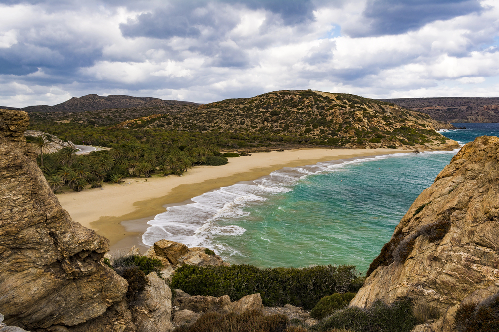 Empty beach in Crete, warm places to visit in December in Europe
