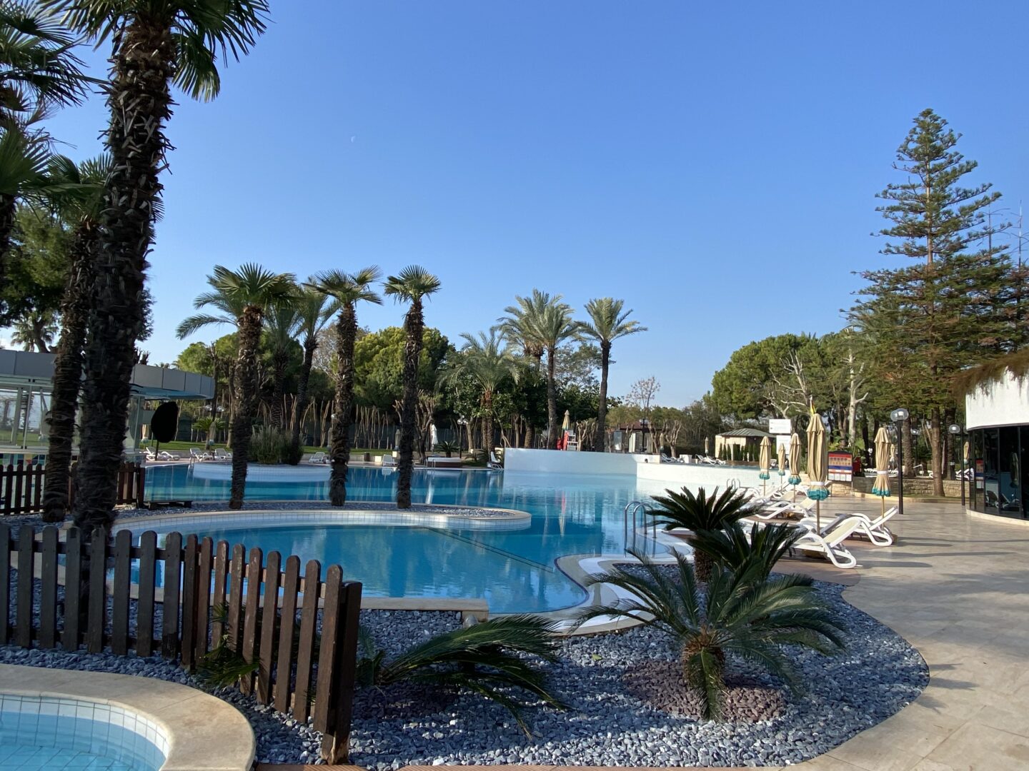 hotel pool and sunshine in Antalya in December, warm places to visit in December in Europe
