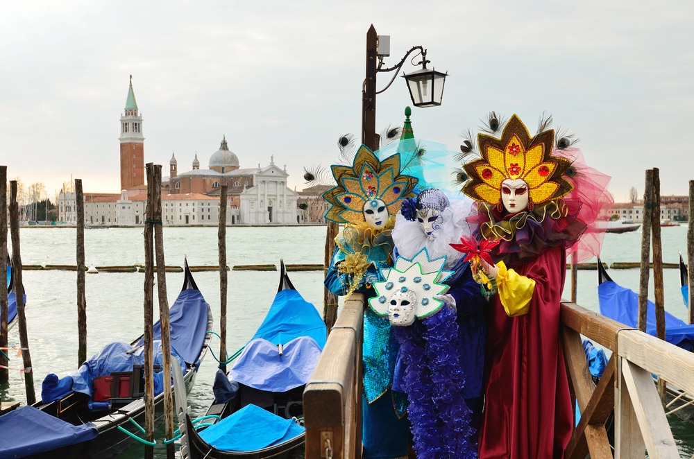 People dressed for Venice Carnival, best countries to visit in February