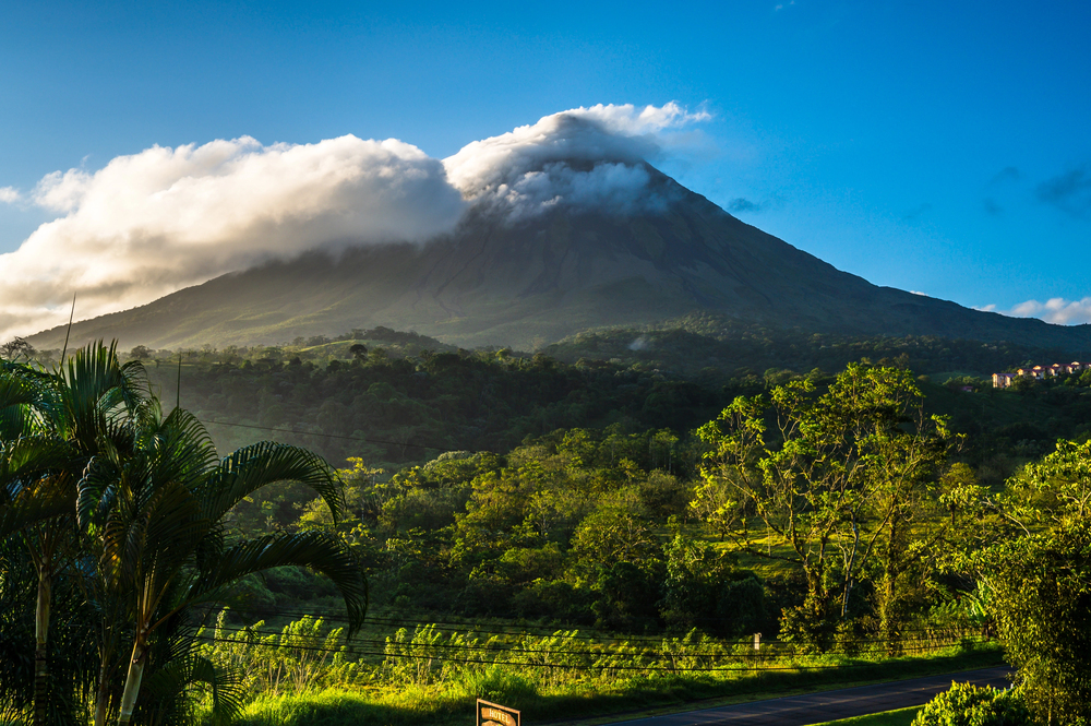 Volcano and green trees Costa Rica, best countries to visit in January,
