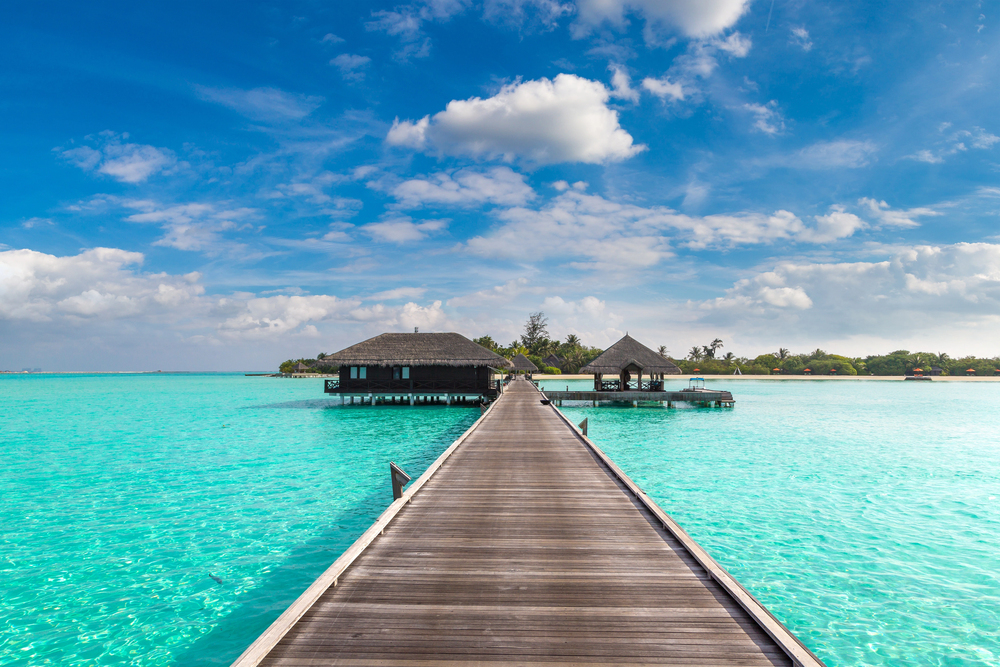 Pathway to Maldives overwater bungalow, best countries to visit in January,